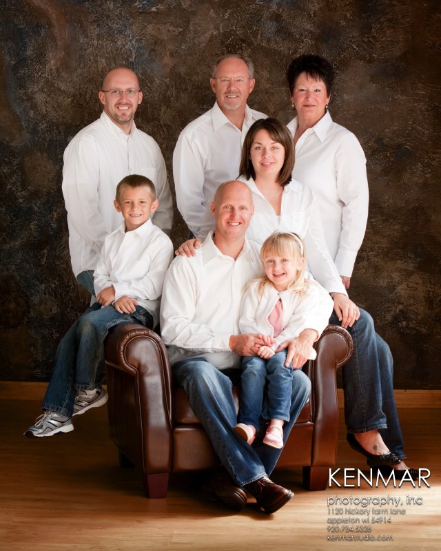 Family of 7 in white on a darker background