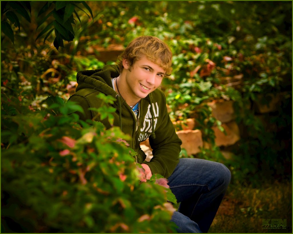 Young man posed outdoors