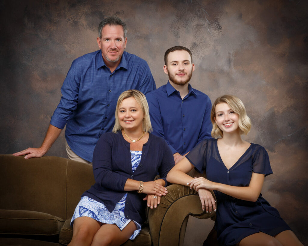 KenMar specializes in large family groups, indoors and out with a huge variety of props, chairs, couches and different backdrops with flattering lighting and comfortable slice-of-life posing