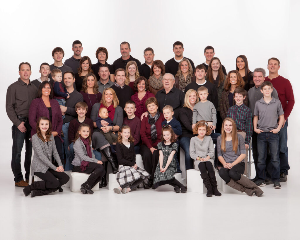 KenMar specializes in large family groups, indoors and out with a huge variety of props, chairs, couches and different backdrops with flattering lighting and comfortable slice-of-life posing