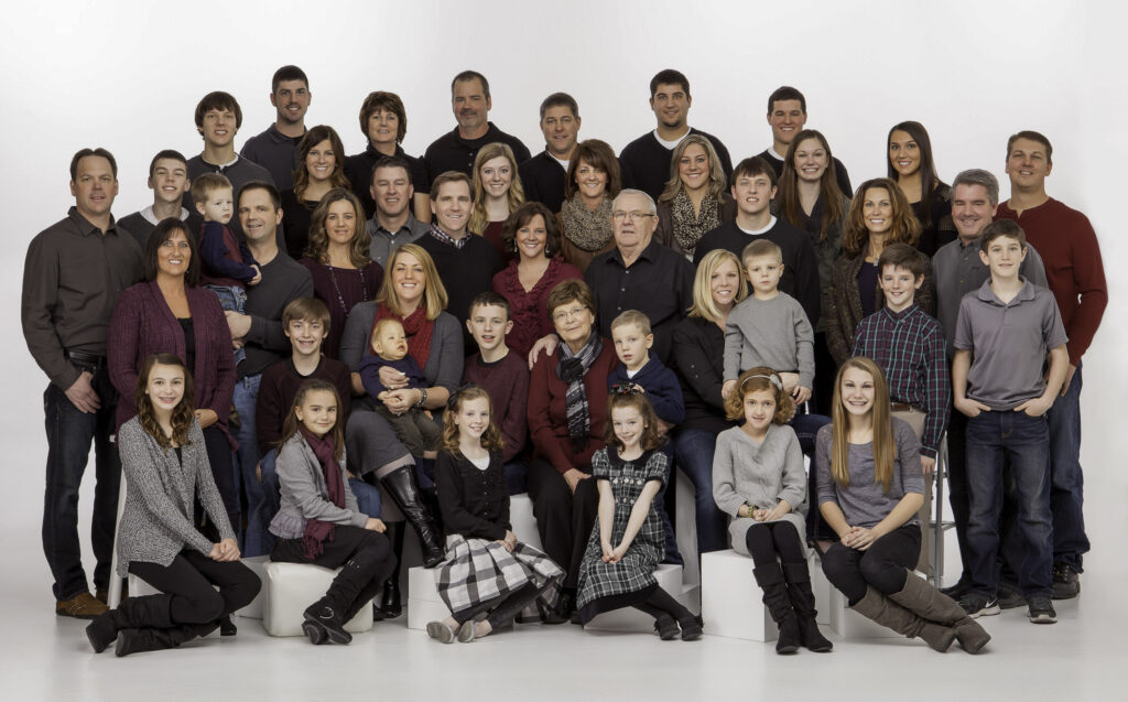 KenMar specializes in large family groups, indoors and out with a huge variety of props, chairs, couches and different backdrops with flattering lighting and comfortable slice-of-life posing